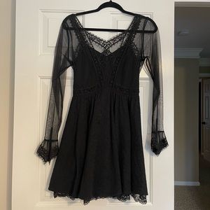 Free people black dress- netting sleeves. Great condition. Only worn once!